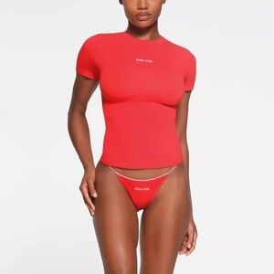 Skims Cotton Jersey Embroidered T Shirt in Ruby Worn